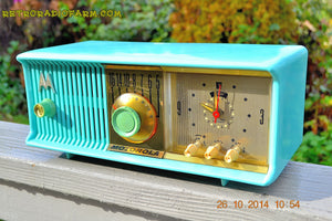 SOLD! - Nov 28, 2014 - VIVID Turquoise Retro Jetsons 1957 Motorola 57CC Tube AM Clock Radio WORKS! - [product_type} - Motorola - Retro Radio Farm