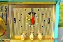 Load image into Gallery viewer, SOLD! - Nov 28, 2014 - VIVID Turquoise Retro Jetsons 1957 Motorola 57CC Tube AM Clock Radio WORKS! - [product_type} - Motorola - Retro Radio Farm