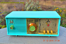 Load image into Gallery viewer, SOLD! - Dec 17, 2014 - VIVID Turquoise Retro Jetsons 1957 Motorola 57CC Tube AM Clock Radio WORKS! - [product_type} - Motorola - Retro Radio Farm