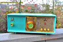 Load image into Gallery viewer, SOLD! - Dec 17, 2014 - VIVID Turquoise Retro Jetsons 1957 Motorola 57CC Tube AM Clock Radio WORKS! - [product_type} - Motorola - Retro Radio Farm