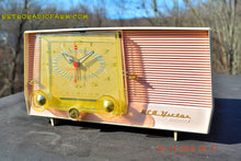 Load image into Gallery viewer, SOLD! - Dec 14, 2015 - BLUETOOTH MP3 READY - Pink and White Retro Jetsons Vintage 1957 RCA C-4FE AM Tube Clock Radio Totally Restored! - [product_type} - RCA Victor - Retro Radio Farm