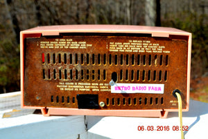 SOLD! - Oct 22, 2016 - PINK CYCLOPIC Vintage Mid Century Retro Jetsons 1957 Bulova Model 140 Tube AM Clock Radio WORKS! - [product_type} - Bulova - Retro Radio Farm