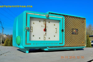 SOLD! - Feb 20, 2015 - BRIGHT SEAFOAM GREEN Retro Jetsons 1957 Bulova Model 120 Tube AM Clock Radio WORKS!
