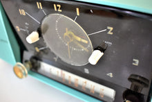 Load image into Gallery viewer, Ocean Turquoise Mid Century 1957 General Electric Model C-417C Vacuum Tube AM Clock Radio Popular Model Sounds Terrific!