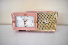 Load image into Gallery viewer, Plaza Pink Gold Mid Century 1957 Bulova Model 120 Tube AM Clock Radio Excellent Condition! Sounds Marvelous!