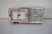 Load image into Gallery viewer, Plaza Pink Gold Mid Century 1957 Bulova Model 120 Tube AM Clock Radio Excellent Condition! Sounds Marvelous!