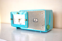 Load image into Gallery viewer, Egyptian Turquoise Gold Mid Century 1957 Bulova Model 120 Vacuum Tube AM Clock Radio Excellent Condition! Sounds Great!