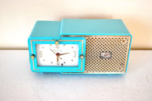 Load image into Gallery viewer, Egyptian Turquoise Gold Mid Century 1957 Bulova Model 120 Vacuum Tube AM Clock Radio Excellent Condition! Sounds Great!