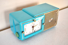 Load image into Gallery viewer, Egyptian Turquoise Gold Mid Century 1957 Bulova Model 120 Vacuum Tube AM Clock Radio Excellent Condition! Sounds Great!