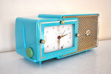 Load image into Gallery viewer, Egyptian Turquoise Gold Mid Century 1957 Bulova Model 120 Vacuum Tube AM Clock Radio Excellent Condition! Sounds Great!