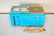 Load image into Gallery viewer, Egyptian Turquoise Gold Mid Century 1957 Bulova Model 120 Vacuum Tube AM Clock Radio Excellent Condition! Sounds Great!