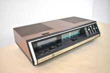 Load image into Gallery viewer, Wood Grain 1977 General Electric Model 7-4695A AM FM Digital Alarm Clock Radio! Excellent Condition!