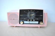 Load image into Gallery viewer, Princess Pink 1957 General Electric Model 913D Vacuum Tube AM Clock Radio Excellent Shape! Sounds Fantastic!