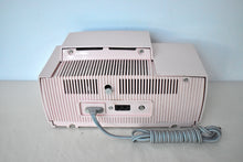 Load image into Gallery viewer, Princess Pink 1957 General Electric Model 913D Vacuum Tube AM Clock Radio Excellent Shape! Sounds Fantastic!