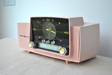 Load image into Gallery viewer, Princess Pink 1957 General Electric Model 913D Vacuum Tube AM Clock Radio Excellent Shape! Sounds Fantastic!