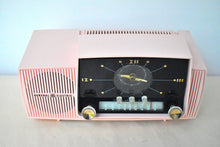 Load image into Gallery viewer, Princess Pink 1957 General Electric Model 913D Vacuum Tube AM Clock Radio Excellent Shape! Sounds Fantastic!