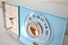 Load image into Gallery viewer, Powder Blue 1959 General Electric Model C-404B Vacuum Tube AM Clock Radio Excellent Condition! Sounds Great!