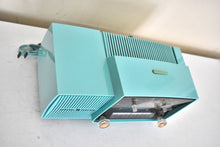 Load image into Gallery viewer, Ocean Turquoise Mid Century 1957 General Electric Model C-417C Vacuum Tube AM Clock Radio Popular Model Sounds Terrific!