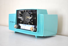 Load image into Gallery viewer, Ocean Turquoise Mid Century 1957 General Electric Model C-417C Vacuum Tube AM Clock Radio Popular Model Sounds Terrific!