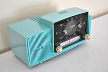 Load image into Gallery viewer, Ocean Turquoise Mid Century 1957 General Electric Model C-417C Vacuum Tube AM Clock Radio Popular Model Sounds Terrific!