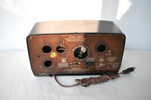 Load image into Gallery viewer, Ebony Ivory 1950 Jewel Wakemaster Model 5057U Vacuum Tube AM Clock Radio Beautiful Design Sounds Great!