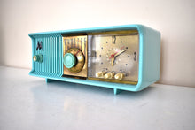 Load image into Gallery viewer, Aquamarine Turquoise 1957 Motorola Model 56CD4 Vacuum Tube AM Clock Radio Rare Model and Color Sounds Fantastic!