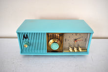 Load image into Gallery viewer, Aquamarine Turquoise 1957 Motorola Model 56CD4 Vacuum Tube AM Clock Radio Rare Model and Color Sounds Fantastic!