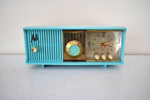 Load image into Gallery viewer, Aquamarine Turquoise 1957 Motorola Model 56CD4 Vacuum Tube AM Clock Radio Rare Model and Color Sounds Fantastic!