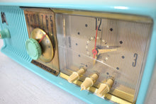 Load image into Gallery viewer, Aquamarine Turquoise 1957 Motorola Model 56CD4 Vacuum Tube AM Clock Radio Rare Model and Color Sounds Fantastic!