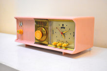 Load image into Gallery viewer, Marilyn Pink Mid Century 1957 Motorola Model 57CC2 Vacuum Tube AM Clock Radio Sounds Great! Looks Great!