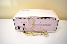 Load image into Gallery viewer, Powder Pink Mid-Century 1963 Motorola Model C19P60 Vacuum Tube AM Clock Radio Rare Color Combo!