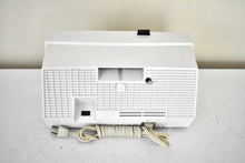 Load image into Gallery viewer, Beige Pink and White 1959 RCA Victor Model 1-C-5KE Vacuum Tube AM Clock Radio Beautiful Design and Sounds Fabulous!