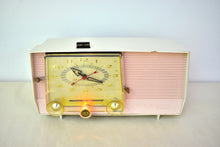 Load image into Gallery viewer, Carnation Pink and White 1959 RCA Victor Model C-4FE Vacuum Tube AM Clock Radio Beautiful Design and Sounds Fabulous!