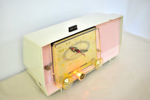 Load image into Gallery viewer, Carnation Pink and White 1959 RCA Victor Model C-4FE Vacuum Tube AM Clock Radio Beautiful Design and Sounds Fabulous!