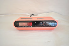 Load image into Gallery viewer, Hot Pink 80s Realistic Model 12-8601 AM FM Digital Clock Radio! Sounds Great Excellent Condition! Rare Model!