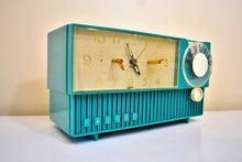 Load image into Gallery viewer, Seafoam Green 1958 Philco Model F758-124 AM Vacuum Tube Radio Rare Awesome Color Sounds Great!
