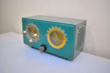 Load image into Gallery viewer, Mariner Green 1955 General Electric Model 566 AM Vacuum Tube Clock Radio Porthole Design Sounds and Looks Great!