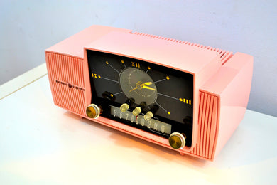 SOLD! - March 2, 2019 - Bellefonte Pink 1957 General Electric Model 912D Tube AM Clock Radio