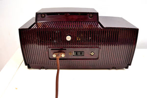 SOLD! - Mar 3, 2020 - Burgundy Brown 1957 General Electric Model 912 Vacuum Tube AM Clock Radio Solid Player Lovely Swirl! - [product_type} - General Electric - Retro Radio Farm