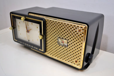 SOLD! - Feb 21, 2020 - Luxor Black and Gold 1957 Bulova Model 120 Tube AM Clock Radio Excellent Condition!!