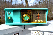 Load image into Gallery viewer, SOLD! - May 17, 2018 - VIVID Turquoise Retro Jetsons 1957 Motorola 57CC Tube AM Clock Radio Excellent! - [product_type} - Motorola - Retro Radio Farm