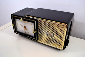 SOLD! - Mar 8, 2019 - Luxor Black 1957 Bulova Model 120 Tube AM Clock Radio Excellent Condition! - [product_type} - Bulova - Retro Radio Farm