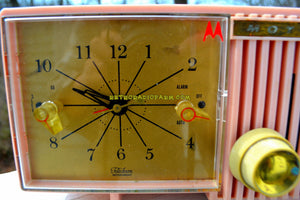 SOLD! - Apr 25, 2019 - Cherry Blossom Pink Motorola 1959 Model 57CF Clock Radio Tube AM Clock Radio - [product_type} - Motorola - Retro Radio Farm