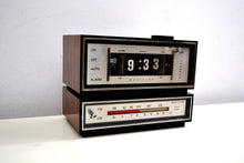 Charger l&#39;image dans la galerie, Genuine Faux Wood Grain 1974 Westclox AM/FM Solid State Clock Radio Alarm Rare Film Strip Model! - [product_type} - Westclox - Retro Radio Farm