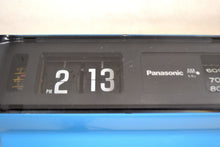 Load image into Gallery viewer, Orbit Blue 70s Panasonic Model RC-1103 Flip Clock Solid State AM Radio Works Great! - [product_type} - Panasonic - Retro Radio Farm