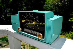 SOLD! - Nov 24, 2018 - Seafoam Green Mid Century Jetsons 1957 General Electric Model 912D Tube AM Clock Radio Sweet! - [product_type} - General Electric - Retro Radio Farm