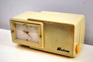 SOLD! - Aug 10, 2019 - Palace Ivory and Gold 1959 Bulova Model 100 Tube AM Clock Radio Excellent Condition!