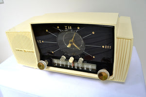 SOLD! - Aug 8, 2018 - CREAM IVORY Mid Century Jetsons 1957 General Electric Model 912 Tube AM Clock Radio Sweet!