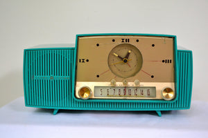 SOLD! - Sept 17, 2018 - Teal Goody Mid Century Jetsons 1957 General Electric Model 914 Tube AM Clock Radio Eye Popper! - [product_type} - General Electric - Retro Radio Farm