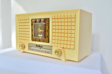 SOLD! - July 10, 2019 - 1956 TravLer 56C45 Tube AM Clock Radio in Ivory Cream With Rare Calendar Function!